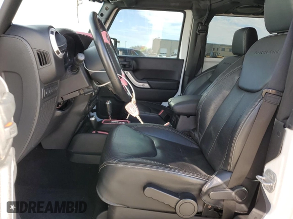 2013 Jeep Wrangler Rubicon с VIN 1C4BJWCG9DL612316, выставлен на аукционе Copart как лот 87823565 с пробегом 66 254 миль миль и Списание • Salvage title. История ставок и продаж доступна на DreamBid. Изображение 7.