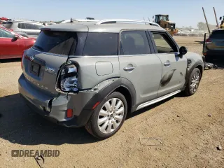 2017 MINI Countryman Cooper with VIN WMZYV5C38H3E01204, listed as a Copart auction lot 70489714 with 86,597 mi miles and Salvage Title. Bid and sale history available at carsss.com. Image 3.