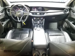 2018 Alfa Romeo Stelvio z VIN ZASFAKAN0J7C04021, wystawiony jako Copart lot #53308355 z przebiegiem 58 192 mil mil oraz Szkoda całkowita • Salvage title. Historia ofert i sprzedaży dostępna na DreamBid. Obrazek 8.