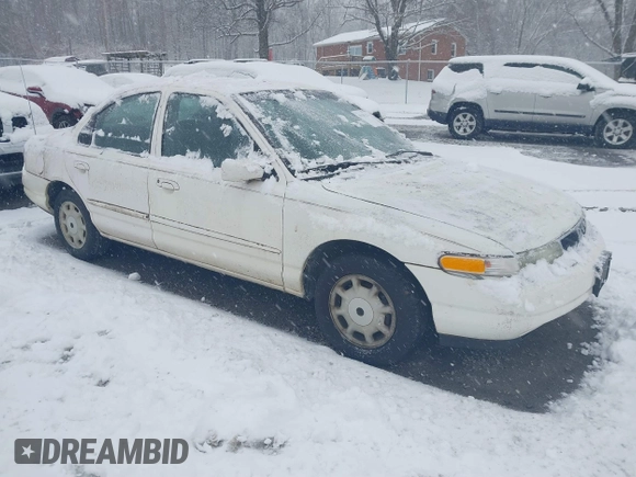 1996 Mercury Mystique z VIN 1MELM653XTK605481, wystawiony jako IAAI lot #41543215 z przebiegiem 120 988 mil mil oraz . Historia ofert i sprzedaży dostępna na DreamBid. Obrazek 1.