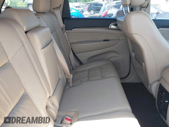 2014 Jeep Grand Cherokee Limited z VIN 1C4RJFBGXEC479342, wystawiony jako IAAI lot #42514199 z przebiegiem 207 493 mil mil oraz . Historia ofert i sprzedaży dostępna na DreamBid. Obrazek 8.