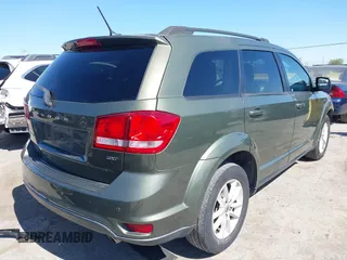 2018 Dodge Journey SXT with VIN 3C4PDCBG4JT234029, listed as a IAAI auction lot 42530733 with 225,955 mi miles and . Bid and sale history available at DreamBid. Image 4.