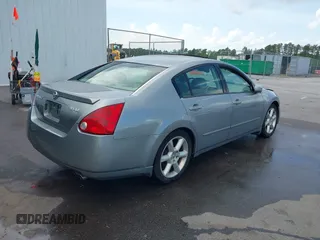2004 Nissan Maxima SE with VIN 1N4BA41EX4C881792, listed as a IAAI auction lot 42083849 with 166,034 mi miles. Bid and sale history available at carsss.com. Image 4.