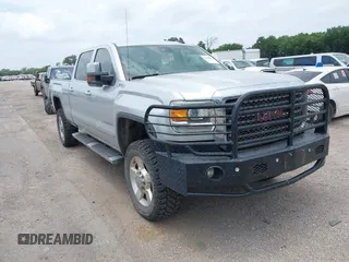 2016 GMC Sierra 2500HD SLT with VIN 1GT12TEG9GF295368, listed as a IAAI auction lot 42390811 with 148,287 mi miles and . Bid and sale history available at DreamBid. Image 1.