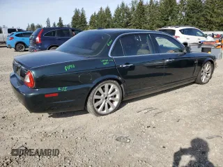 2008 Jaguar XJ with VIN SAJWA79BX8SH23430, listed as a Copart auction lot 51990785 with 140,454 mi miles and Salvage Title. Bid and sale history available at carsss.com. Image 3.