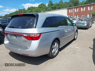 2012 Honda Odyssey Touring with VIN 5FNRL5H9XCB026741, listed as a IAAI auction lot 42808245 with 293,422 mi miles and . Bid and sale history available at DreamBid. Image 4.