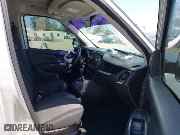 2021 Ram ProMaster City Cargo Tradesman SLT with VIN ZFBHRFBB6M6T38499, listed as a IAAI auction lot 42190007 with 73,186 mi miles. Bid and sale history available at carsss.com. Image 5.
