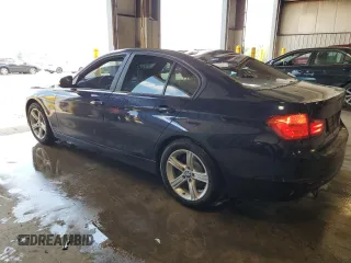 2014 BMW 3 Series 320i with VIN WBA3B1G5XENT00747, listed as a Copart auction lot 64737935 with 123,374 mi miles and Salvage title. Bid and sale history available at DreamBid. Image 2.
