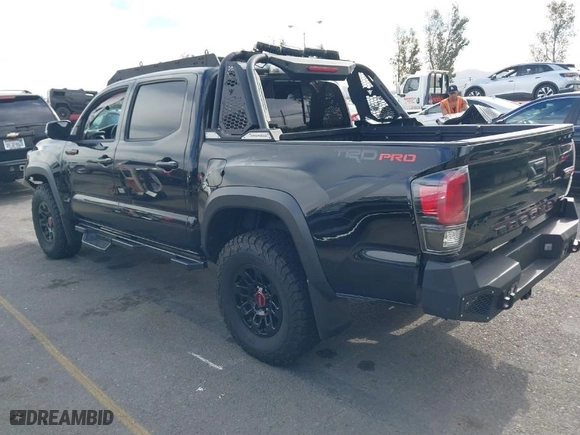 2019 Toyota Tacoma 4WD SR with VIN 5TFCZ5AN5KX193668, listed as a IAAI auction lot 41248429 with 60,812 mi miles. Bid and sale history available at carsss.com. Image 3.