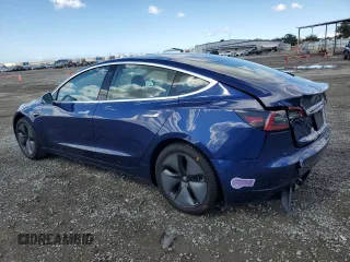 2019 Tesla Model 3 Mid Range with VIN 5YJ3E1EA8KF299456, listed as a Copart auction lot 48152695 with 27,144 mi miles and Salvage Title. Bid and sale history available at DreamBid. Image 2.