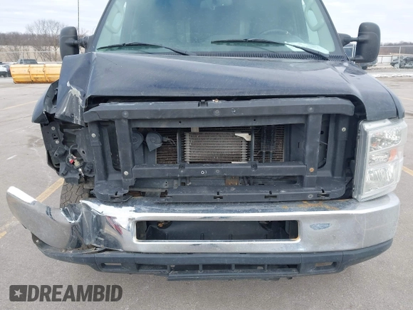 2014 Ford Econoline Cargo Commercial with VIN 1FTNE1EW3EDA76161, listed as a IAAI auction lot 41242287 with 173,870 mi miles and . Bid and sale history available at DreamBid. Image 6.