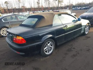2004 BMW 3 Series 325Ci with VIN WBABW33474PG98269, listed as a IAAI auction lot 41457542 with 999,999 mi miles. Bid and sale history available at carsss.com. Image 4.