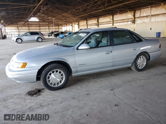 1995 Ford Taurus GL z VIN 1FALP524XSG154141, wystawiony jako Copart lot #77271544 z przebiegiem 72 118 mil mil oraz Czysty tytuł • Clean title. Historia ofert i sprzedaży dostępna na DreamBid. Obrazek 1.