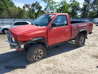 1995 Nissan Frontier XE with VIN 1N6SD11Y1SC371268, listed as a Copart auction lot 61261665 with 80,230 mi miles and Salvage title. Bid and sale history available at DreamBid. Image 1.