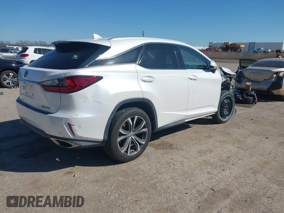 2017 Lexus RX with VIN 2T2ZZMCA3HC059405, listed as a IAAI auction lot 41741013 with 61,441 mi miles. Bid and sale history available at carsss.com. Image 4.