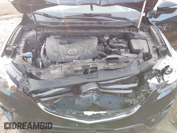 2016 Mazda CX-5 Grand Touring with VIN JM3KE4DY1G0823989, listed as a IAAI auction lot 41770149 with 40,677 mi miles. Bid and sale history available at carsss.com. Image 10.