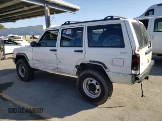 2000 Jeep Cherokee SE with VIN 1J4FF28S5YL243656, listed as a Copart auction lot 71364434 with 222,032 mi miles and Salvage Title. Bid and sale history available at carsss.com. Image 2.