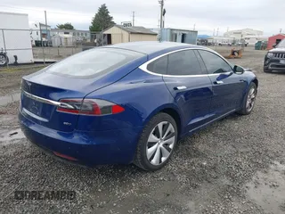 2017 Tesla Model S 100D with VIN 5YJSA1E25HF184502, listed as a IAAI auction lot 41834310 with 92,887 mi miles and . Bid and sale history available at DreamBid. Image 4.