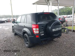 2010 Suzuki Grand Vitara Premium z VIN JS3TE0D25A4100407, wystawiony jako IAAI lot #42249747 z przebiegiem 138 781 mil mil oraz . Historia ofert i sprzedaży dostępna na DreamBid. Obrazek 3.