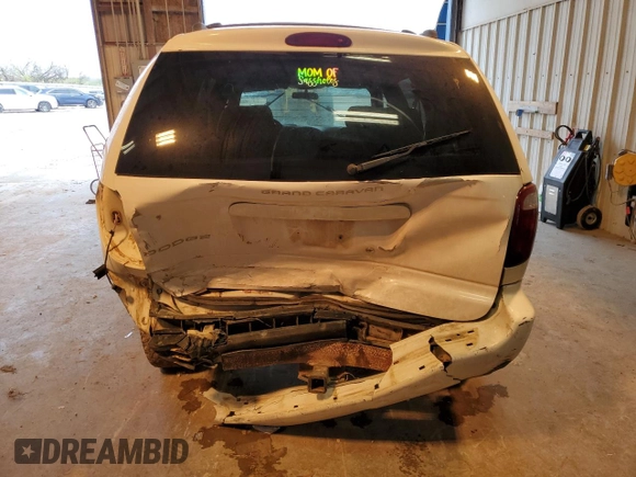 2003 Dodge Caravan Sport with VIN 2D4GP44L73R101409, listed as a Copart auction lot 51632205 with 242,567 mi miles and Salvage Title. Bid and sale history available at DreamBid. Image 6.