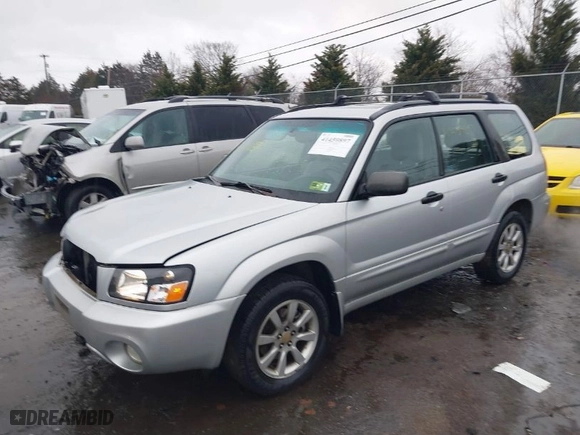 2005 Subaru Forester (Natl) XS with VIN JF1SG65675H748182, listed as a IAAI auction lot 41459897 with 307,068 mi miles. Bid and sale history available at carsss.com. Image 2.