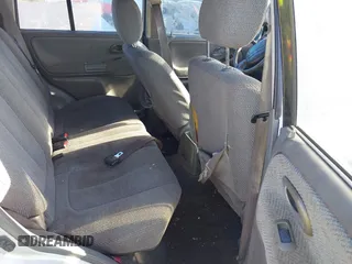 2000 Suzuki Grand Vitara z VIN JS3TE62V6Y4109305, wystawiony jako IAAI lot #41937744 z przebiegiem 255 231 mil mil oraz . Historia ofert i sprzedaży dostępna na DreamBid. Obrazek 8.