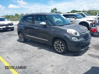 2014 FIAT 500L Lounge with VIN ZFBCFACH1EZ007001, listed as a IAAI auction lot 42716937 with 83,722 mi miles and . Bid and sale history available at DreamBid. Image 1.