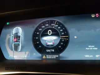 2014 Tesla Model S 60 with VIN 5YJSA1H13EFP49912, listed as a IAAI auction lot 41716661 with 129,776 mi miles and . Bid and sale history available at DreamBid. Image 7.