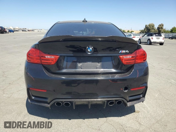 2015 BMW M4 with VIN WBS3R9C50FK333819, listed as a Copart auction lot 61105565 with 168,932 mi miles and Salvage title. Bid and sale history available at DreamBid. Image 6.