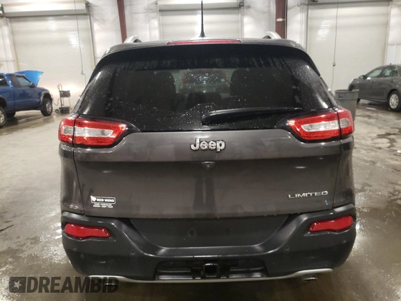 2014 Jeep Cherokee Limited with VIN 1C4PJLDS9EW241374, listed as a Copart auction lot 61048025 with 77,697 mi miles and Salvage title. Bid and sale history available at DreamBid. Image 6.