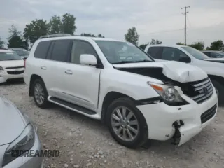 2011 Lexus LX 570 with VIN JTJHY7AX7B4082169, listed as a Copart auction lot 61801895 with 174,635 mi miles and Clean title. Bid and sale history available at DreamBid. Image 4.