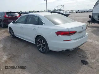 2021 Volkswagen Passat SE z VIN 1VWSA7A30MC016627, wystawiony jako IAAI lot #41904846 z przebiegiem 56 969 mil mil oraz . Historia ofert i sprzedaży dostępna na DreamBid. Obrazek 3.