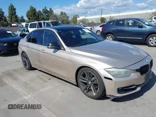 2013 BMW 3 Series 328i with VIN WBA3C1G58DNR44453, listed as a IAAI auction lot 41948831 with 170,153 mi miles. Bid and sale history available at carsss.com. Image 1.