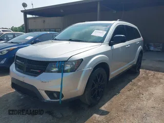2013 Dodge Journey SXT with VIN 3C4PDDBG3DT661924, listed as a IAAI auction lot 42430211 with Not provided miles and . Bid and sale history available at DreamBid. Image 2.