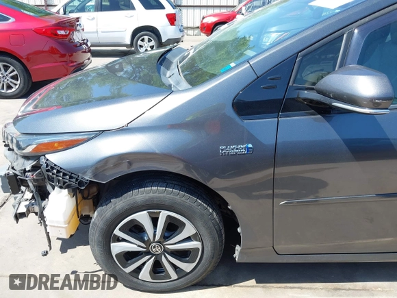 2018 Toyota Prius Plus with VIN JTDKARFP0J3101473, listed as a IAAI auction lot 41857956 with 110,020 mi miles and . Bid and sale history available at DreamBid. Image 19.