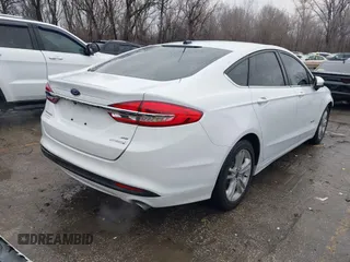 2018 Ford Fusion Hybrid SE with VIN 3FA6P0LU6JR177745, listed as a IAAI auction lot 41433376 with 97,025 mi miles. Bid and sale history available at carsss.com. Image 4.