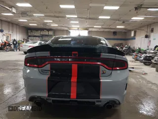 2021 Dodge Charger Scat Pack Widebody with VIN 2C3CDXGJ4MH540627, listed as a IAAI auction lot 41171991 with 31,394 mi miles and . Bid and sale history available at DreamBid. Image 17.