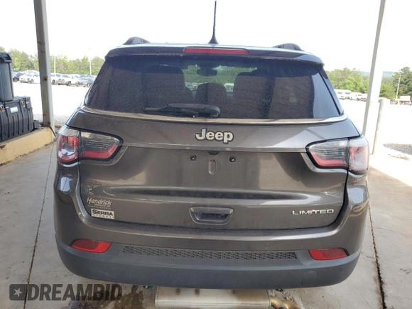 2018 Jeep Compass Limited z VIN 3C4NJCCBXJT361662, wystawiony jako Copart lot #57085315 z przebiegiem 61 815 mil mil oraz Szkoda całkowita • Salvage title. Historia ofert i sprzedaży dostępna na DreamBid. Obrazek 6.