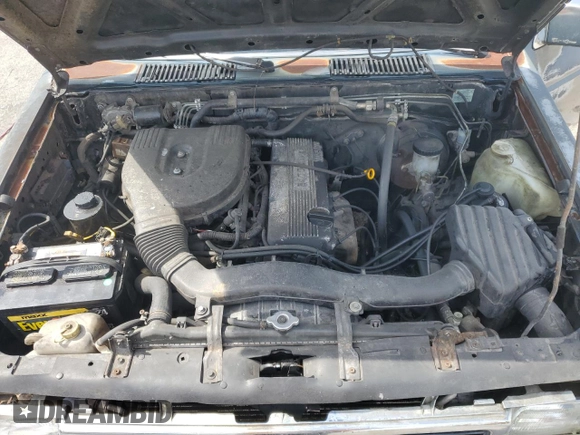 1994 Nissan Frontier XE z VIN 1N6SD16S1RC372743, wystawiony jako Copart lot #54486495 z przebiegiem 206 951 mil mil oraz Szkoda całkowita • Salvage title. Historia ofert i sprzedaży dostępna na DreamBid. Obrazek 11.
