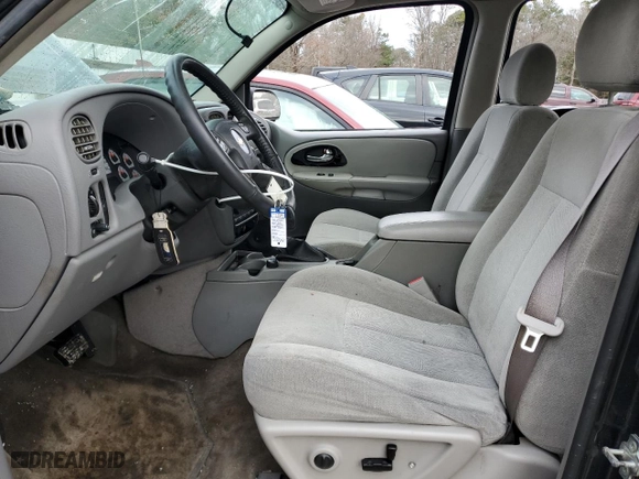 2005 Chevrolet TrailBlazer LS with VIN 1GNES16S656110612, listed as a Copart auction lot 83882094 with 141,465 mi miles and Salvage Title. Bid and sale history available at carsss.com. Image 7.