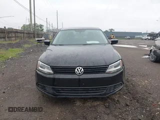 2014 Volkswagen Jetta S with VIN 3VW2K7AJ7EM435702, listed as a IAAI auction lot 42434400 with 117,953 mi miles and . Bid and sale history available at DreamBid. Image 12.