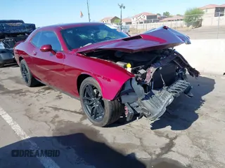 2019 Dodge Challenger SXT z VIN 2C3CDZAG3KH744129, wystawiony jako IAAI lot #42310636 z przebiegiem 103 067 mil mil oraz . Historia ofert i sprzedaży dostępna na DreamBid. Obrazek 1.