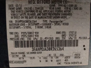 2011 Ford Fusion SEL with VIN 3FAHP0JA3BR265364, listed as a IAAI auction lot 42201329 with 126,000 mi miles. Bid and sale history available at carsss.com. Image 9.