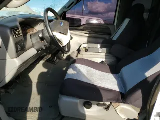 2003 Ford Super Duty F-250 XL with VIN 1FTNX21L83EB37779, listed as a Copart auction lot 77220014 with 160,011 mi miles and Salvage Title. Bid and sale history available at carsss.com. Image 7.
