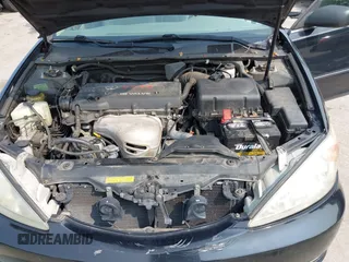 2003 Toyota Camry LE z VIN 4T1BE30KX3U197331, wystawiony jako IAAI lot #42298164 z przebiegiem 248 008 mil mil oraz . Historia ofert i sprzedaży dostępna na DreamBid. Obrazek 10.