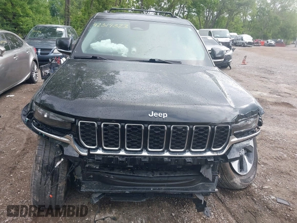 2022 Jeep Grand Cherokee with VIN 1C4RJYB69N8715243, listed as a IAAI auction lot 42319323 with 23,405 mi miles and . Bid and sale history available at DreamBid. Image 13.