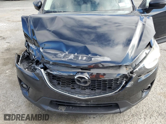 2015 Mazda CX-5 Grand Touring with VIN JM3KE4DY2F0480639, listed as a Copart auction lot 75248594 with 104,652 mi miles and Non Repairable. Bid and sale history available at carsss.com. Image 13.