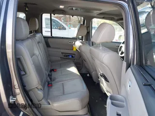 2014 Honda Pilot Touring with VIN 5FNYF4H95EB019048, listed as a IAAI auction lot 41526958 with 172,252 mi miles and . Bid and sale history available at DreamBid. Image 8.