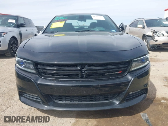 2015 Dodge Charger SXT z VIN 2C3CDXHG7FH777845, wystawiony jako IAAI lot #41791185 z przebiegiem 109 978 mil mil oraz . Historia ofert i sprzedaży dostępna na DreamBid. Obrazek 12.
