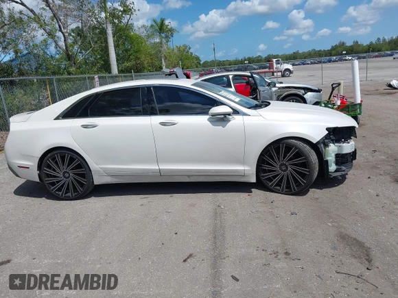 2017 Lincoln MKZ Select z VIN 3LN6L5C98HR607862, wystawiony jako IAAI lot #42072856 z przebiegiem 37 357 mil mil oraz . Historia ofert i sprzedaży dostępna na DreamBid. Obrazek 13.